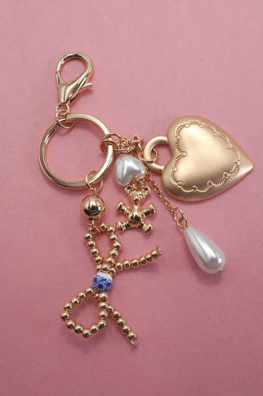 PORCELAIN BOW HEART TEDDY BEAR PEARL BAG CHARM |
